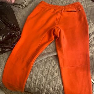 Men’s orange Nike jogger sweatpants